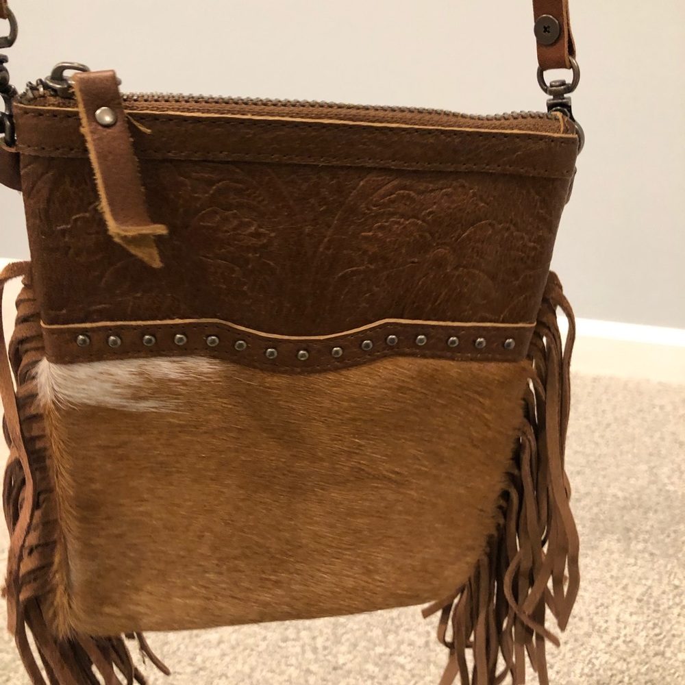 Cowhide fringed purse